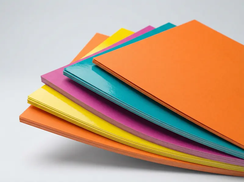 Stacked brochures in bright colors